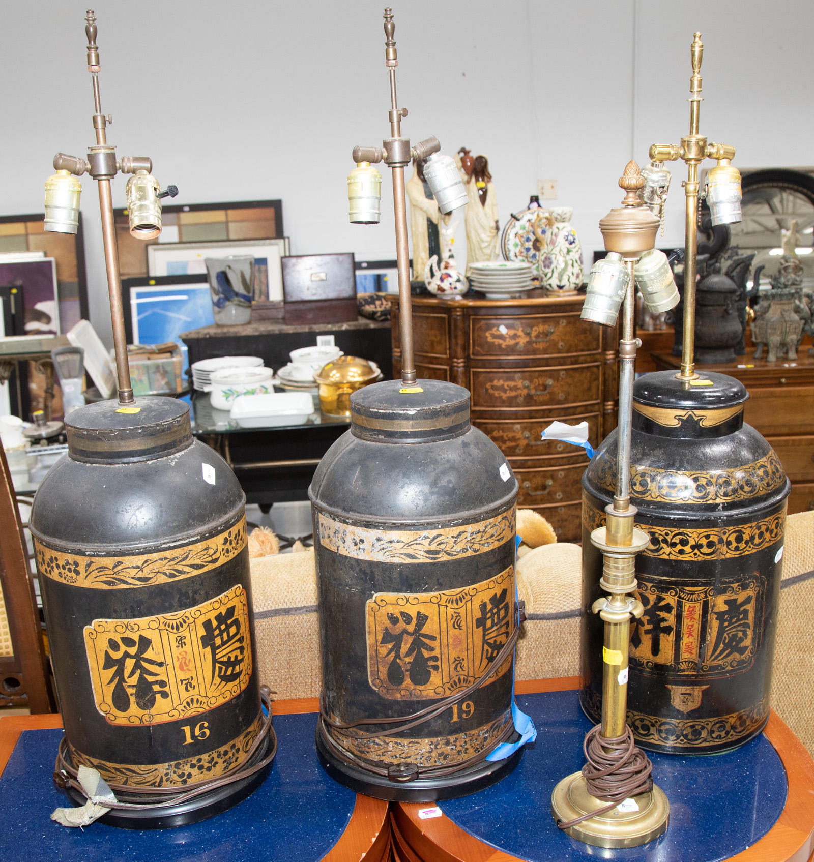 Appraisal: THREE CHINESE STYLE TOLEWARE TEA CANISTERS th century mounted as