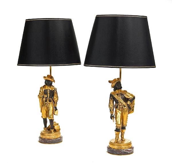 Appraisal: A pair of French gilt and patinated bronze figures now