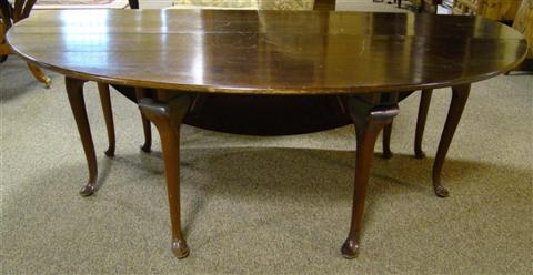 Appraisal: LARGE QUEEN ANNE STYLE MAHOGANY DINING TABLE the rounded rectangular