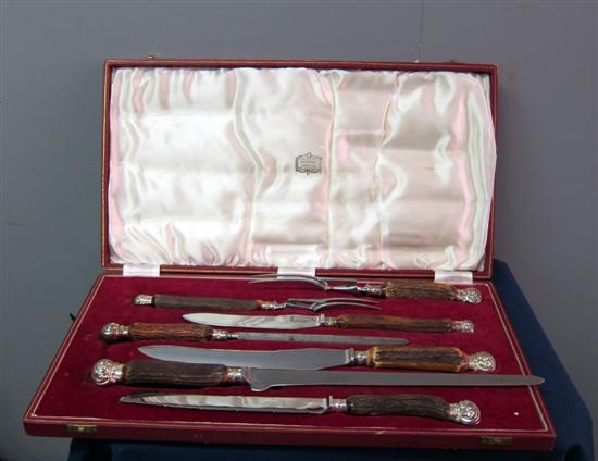 Appraisal: Early twentieth century horn handled and silver plated carving set