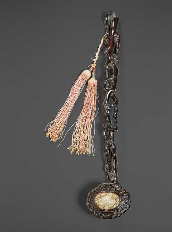 Appraisal: A WOODEN RUYI SCEPTRE CARVED IN THE FORM OF A