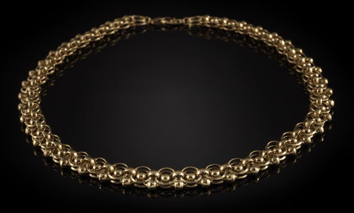 Appraisal: Eighteen-Karat Yellow Gold Circle and Bead Necklace composed of entwined