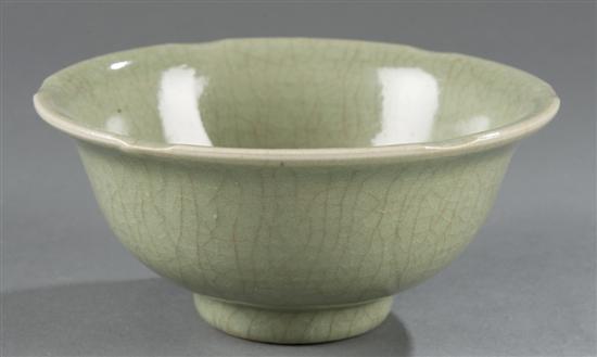 Appraisal: Chinese celadon footed pottery bowl Soft crackle grey-green glaze with