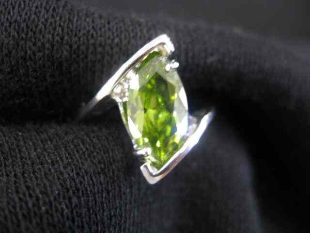 Appraisal: Peridot Ring vivid carat marquise gemin k yellow gold