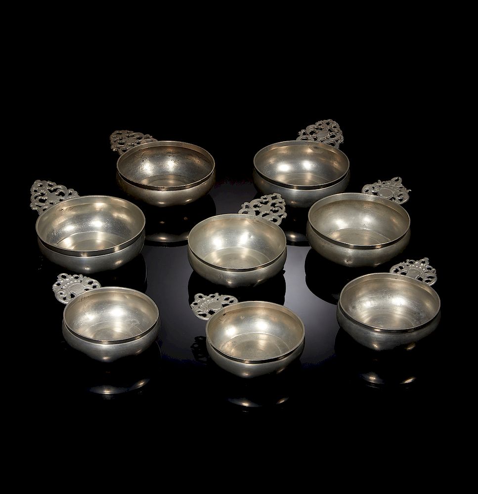 Appraisal: Crown Handled Pewter Porringers Four crown handled pewter porringers and