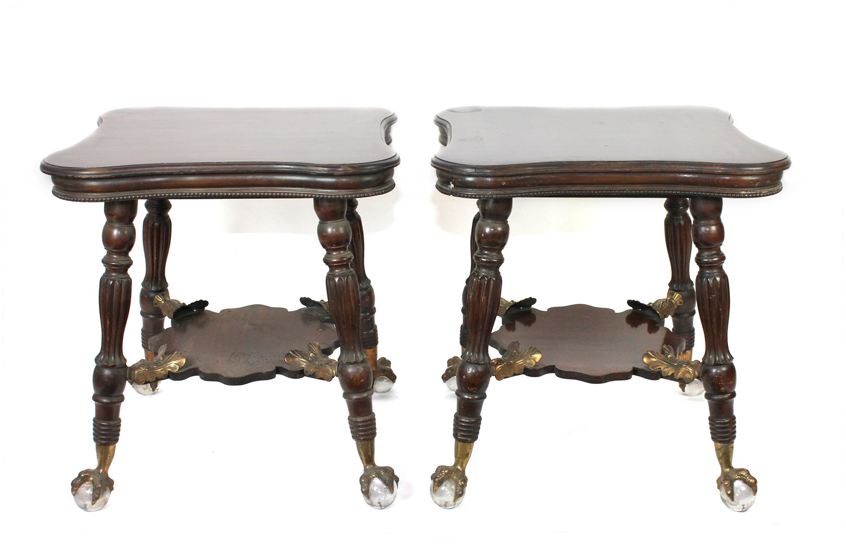 Appraisal: A pair of early th century hardwood occasional tables each