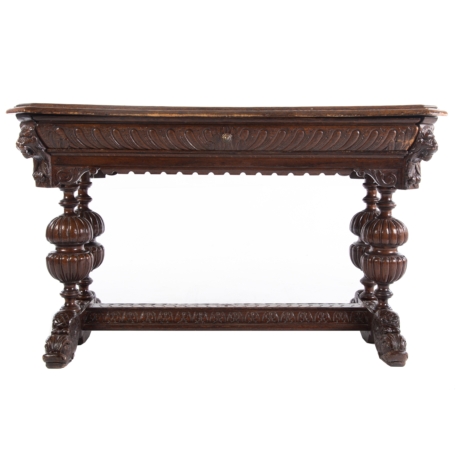 Appraisal: BAROQUE STYLE OAK LIBRARY TABLE th century shaped top with