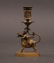 Appraisal: Griffin Candlestick Griffin candlestick features a griffin with a cherub