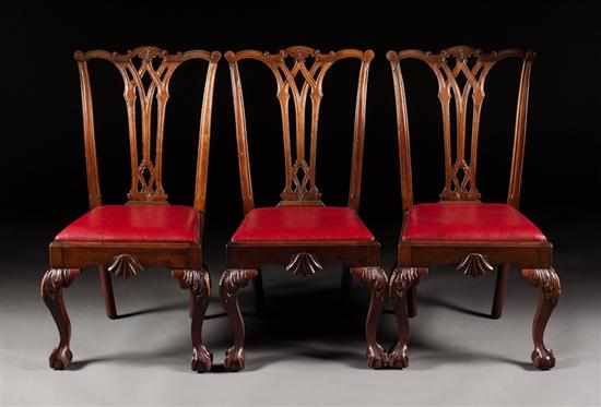 Appraisal: Set of three centennial Chippendale style carved mahogany upholstered side