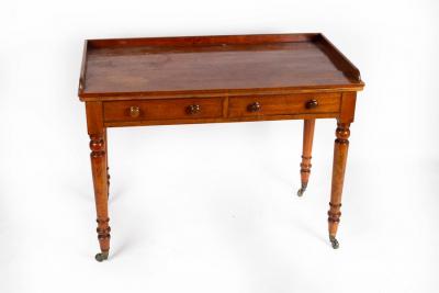 Appraisal: A Victorian mahogany washstand with three-quarter gallery fitted two drawers