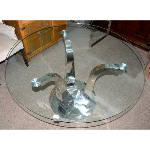 Appraisal: A contemporary polished metal centre table the round plate glass