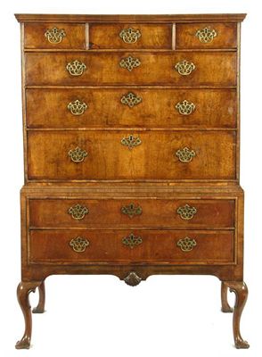 Appraisal: An th century walnut chest on a later stand the