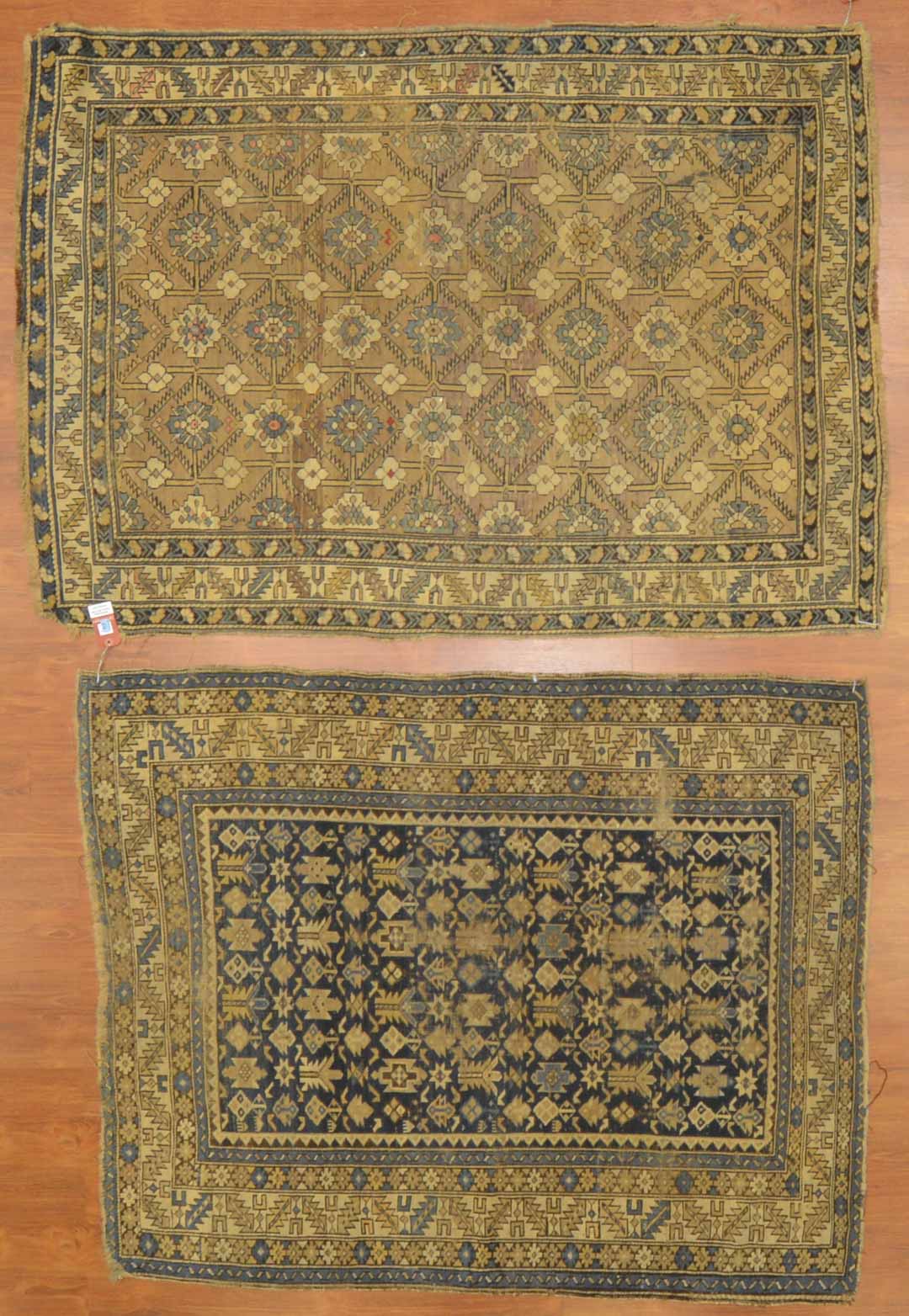 Appraisal: Two antique Caucasian rugs Caucasus circa Sizes are approximately x