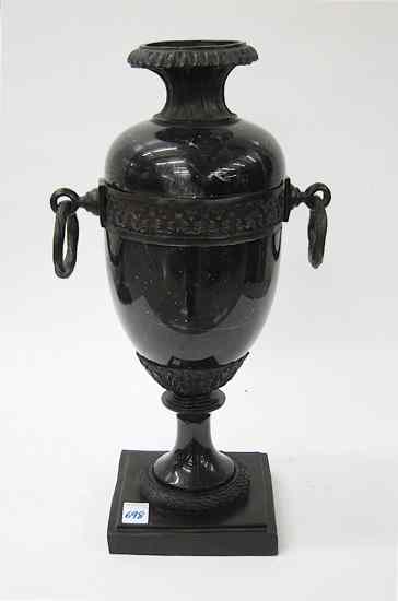 Appraisal: CLASSIC BLACK MARBLE COVERED URN having patinated metal ringed handles