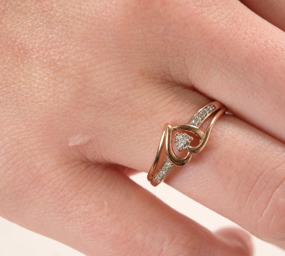 Appraisal: k rose gold heart shaped ring set with round brilliant