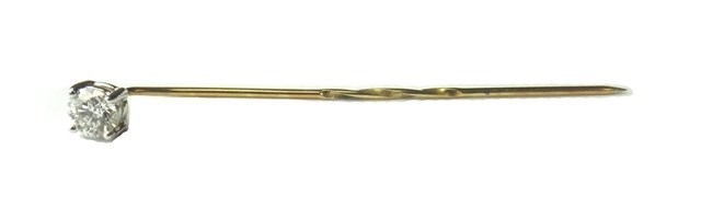 Appraisal: A gold and diamond set single stone stick pin claw