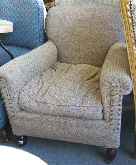 Appraisal: A th mahogany framed grey upholstered armchair on turned supports