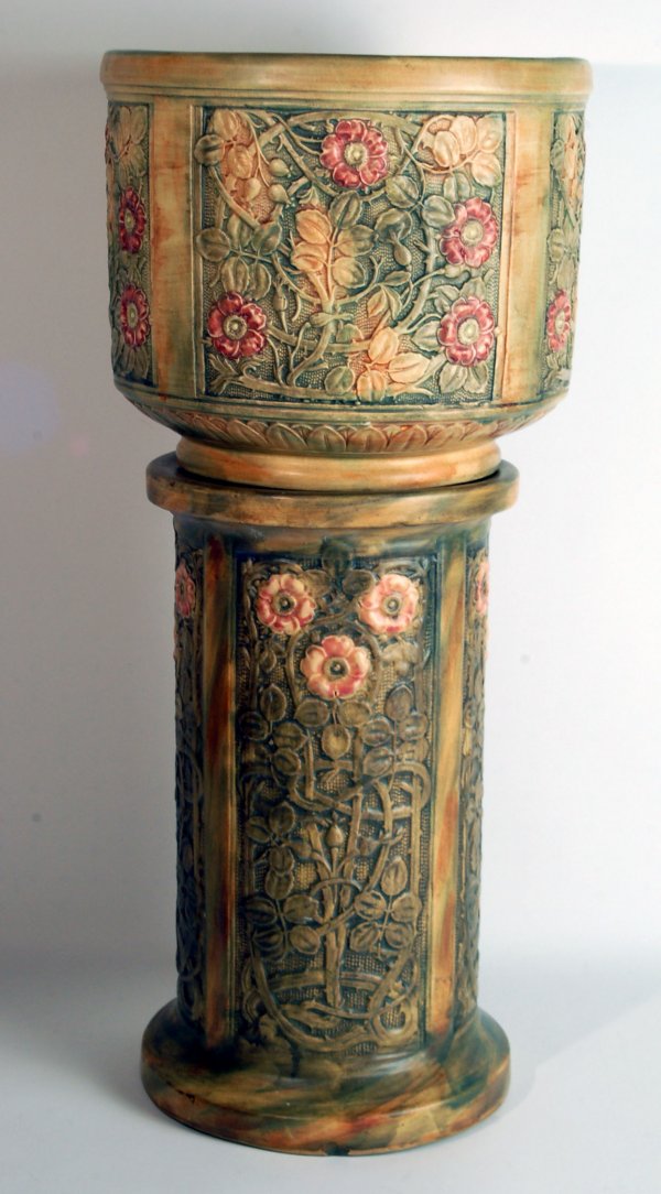 Appraisal: Jardiniere and pedestal by Weller in the Flemish pattern Impressed