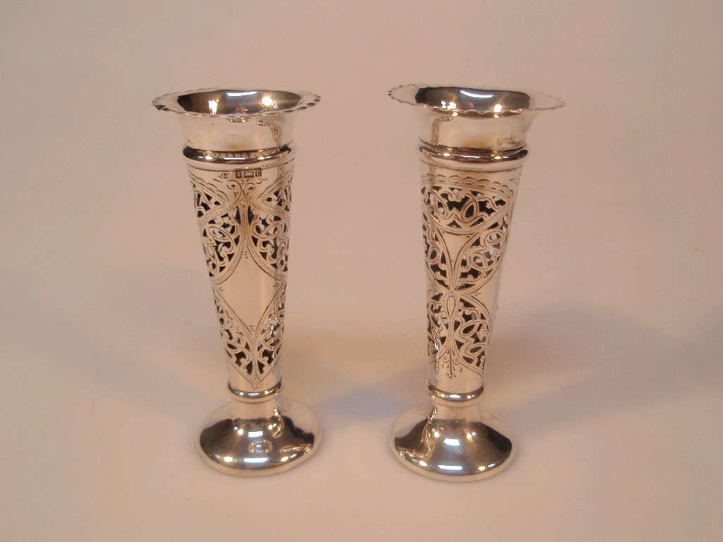 Appraisal: A pair of small silver pierced bud vases no liners