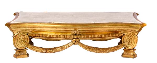 Appraisal: A Neoclassical style giltwood and marble topped coffee table height