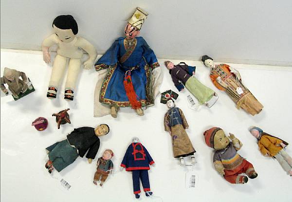 Appraisal: A group of fourteen Chinese and American dolls and cloth-dressed