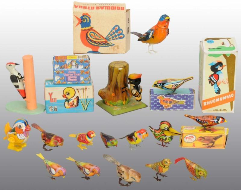 Appraisal: Lot of Plastic Tin Litho Bird Wind-Up Toys Description Chinese