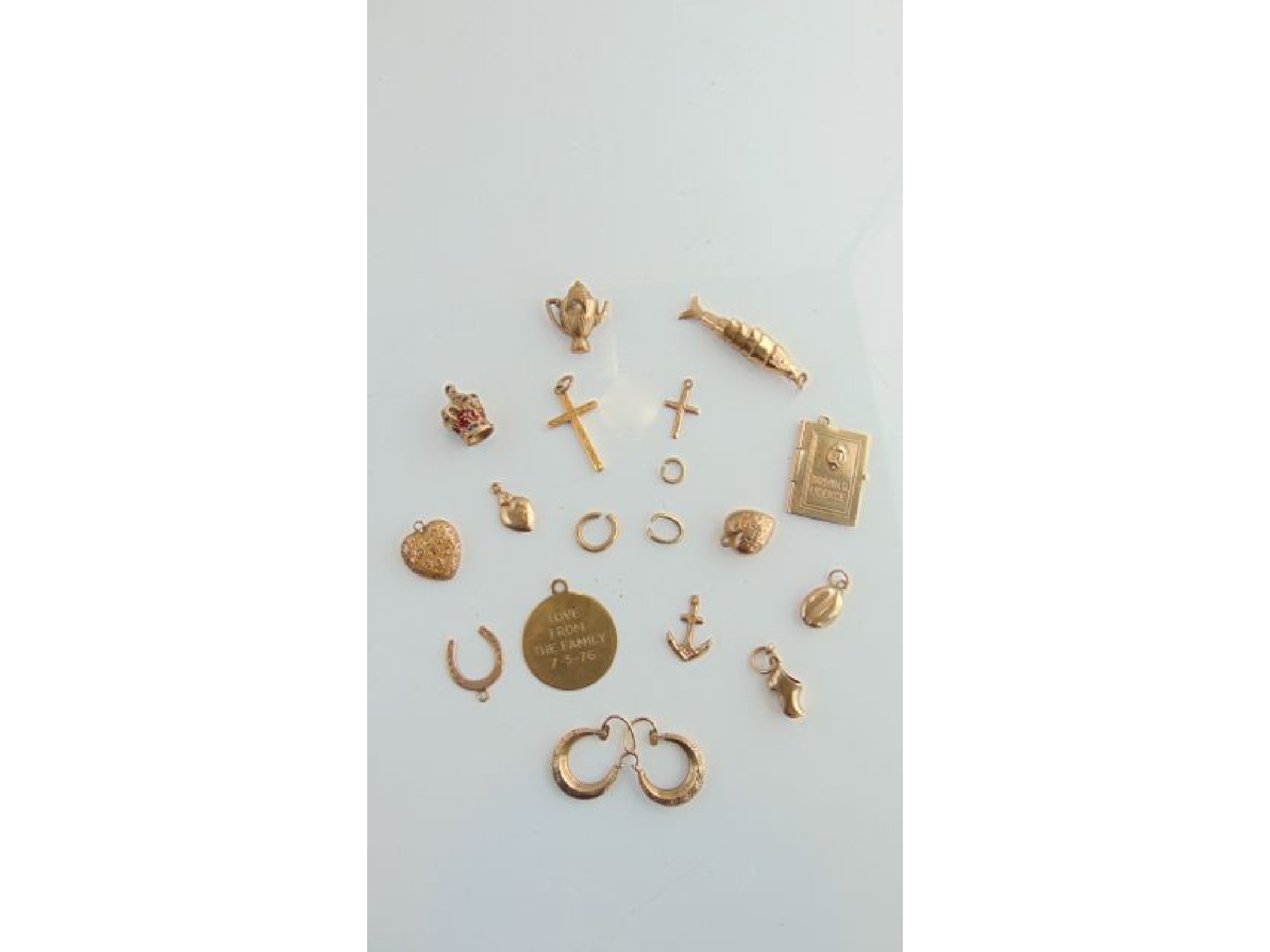 Appraisal: A miscellaneous collection of seven ct gold charms g in