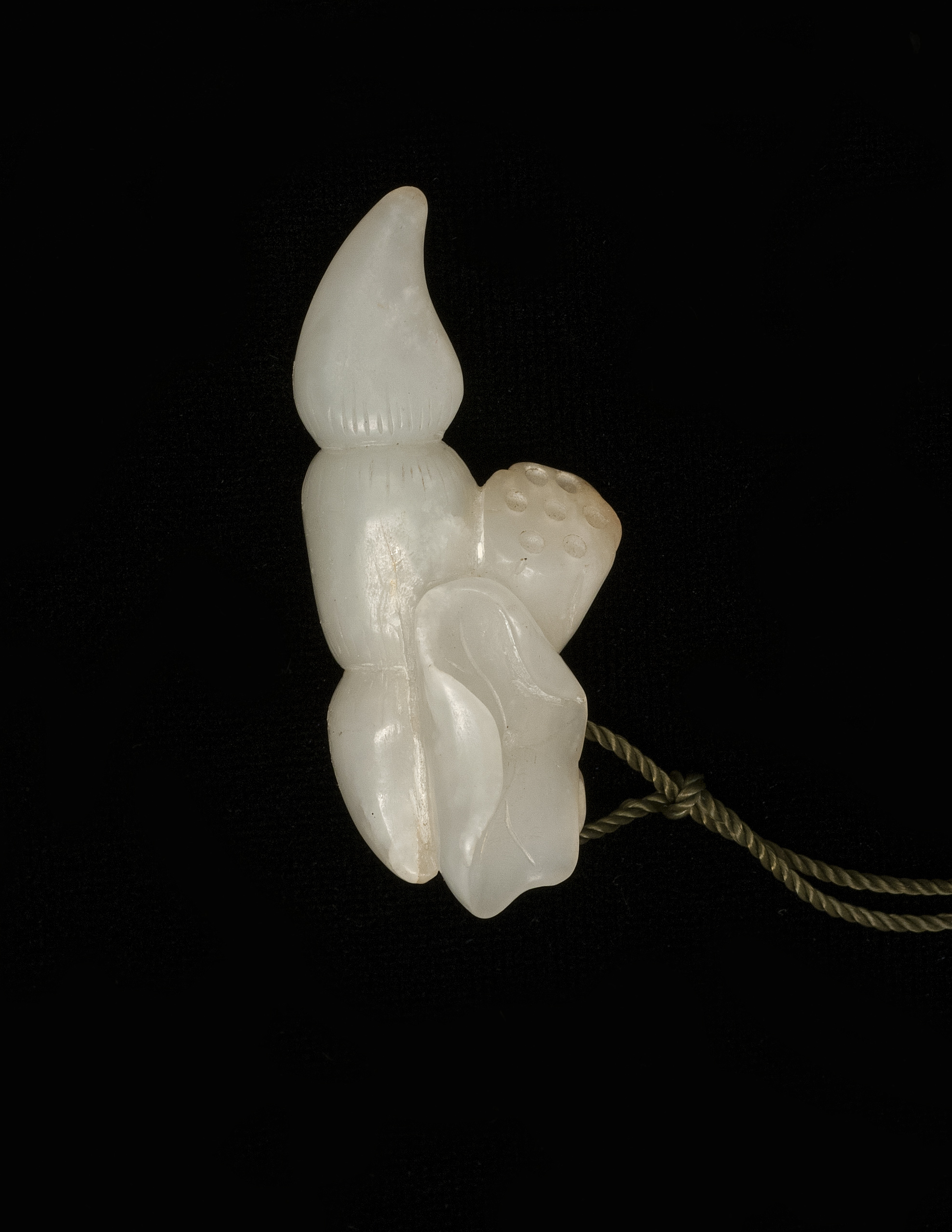 Appraisal: WHITE JADE PENDANT th CenturyCarved with lotus leaf seed pod