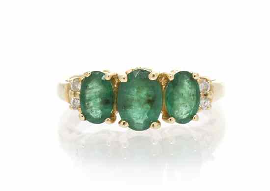 Appraisal: An Karat Yellow Gold Emerald and Diamond Ring containing three