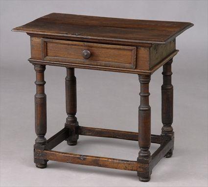 Appraisal: ITALIAN OAK BAROQUE SINGLE DRAWER SIDE TABLE Raised on turned