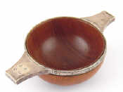 Appraisal: A Scottish provincial silver mounted hardwood quaich the hallmarks prominently