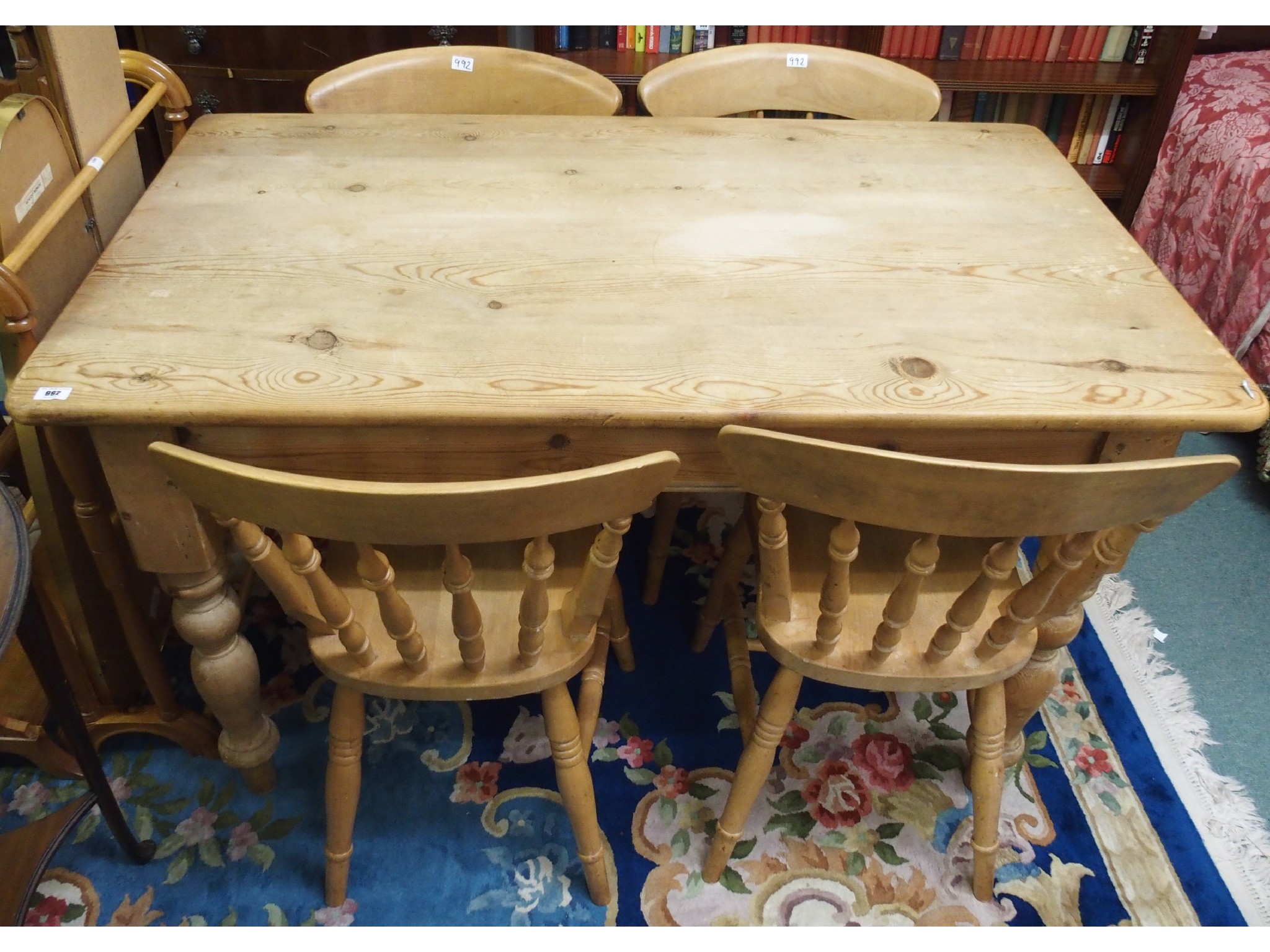 Appraisal: A pine kitchen table and four chairs