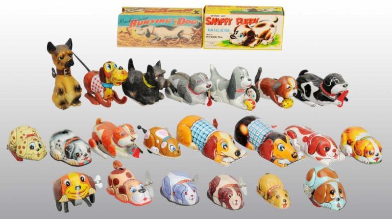 Appraisal: Lot of Tin Vinyl Dog Toys Description Japanese Working Includes