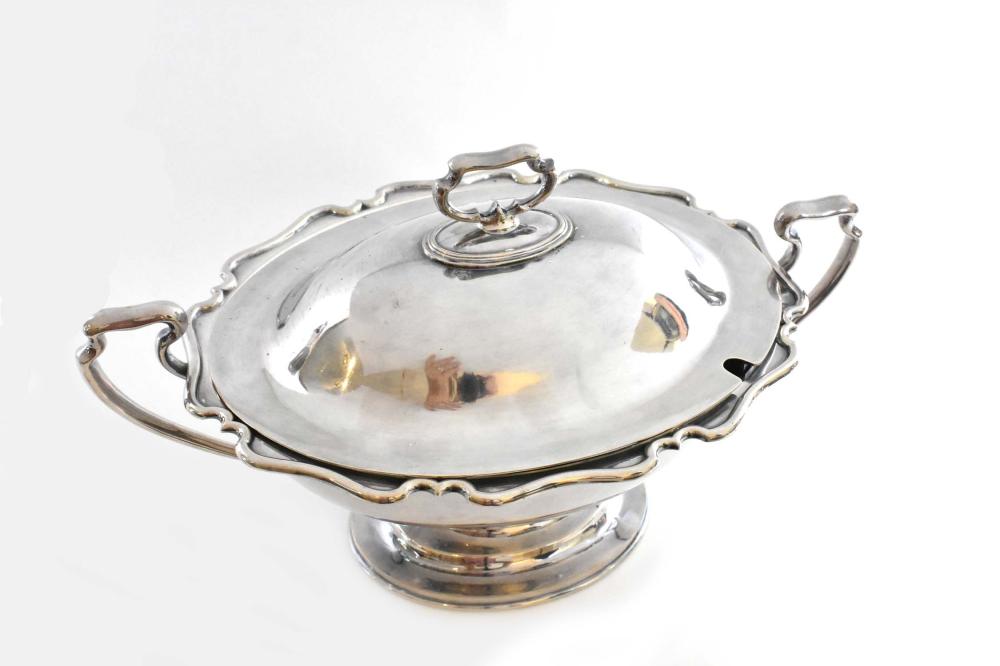 Appraisal: SILVER PLATE COVERED SOUP TUREENModern Of navette form with a