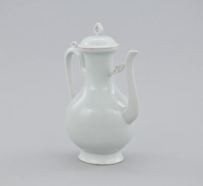 Appraisal: A Porcelain Persian Form Ewer with Lid With a pear