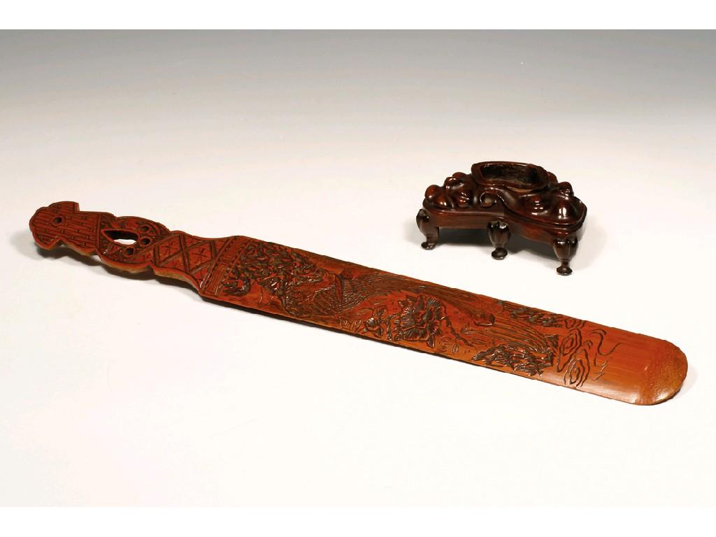 Appraisal: A CHINESE CARVED BAMBOO PAGE TURNER decorated with a bird