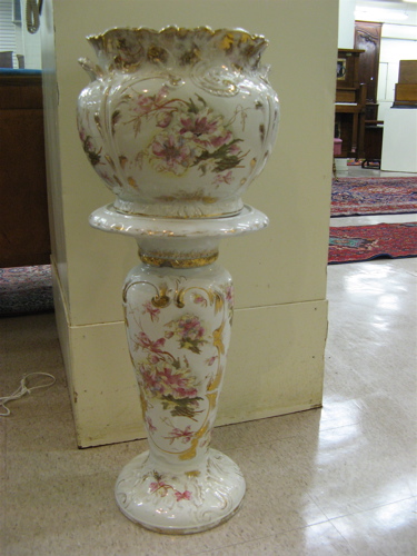 Appraisal: CONTINENTAL POTTERY JARDINIERE MATCHING PEDESTAL having floral decorations and gold