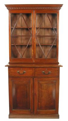 Appraisal: A mahogany bookcase cabinet with a pair of astragal glazed