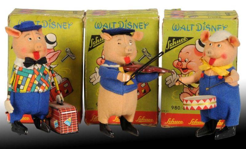 Appraisal: Lot of Schuco Disney Three Little Pigs Toys Description Working