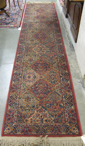 Appraisal: KARASTAN AMERICAN ORIENTAL RUNNER multicolor panel Kerman design machine loomed