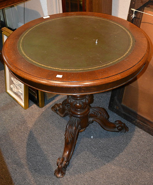 Appraisal: Victorian oak circular centre tablethe top with inset tooled leather