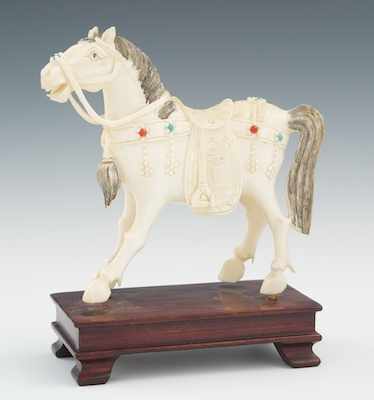 Appraisal: A Carved Ivory or Bone Horse on a Wood Stand