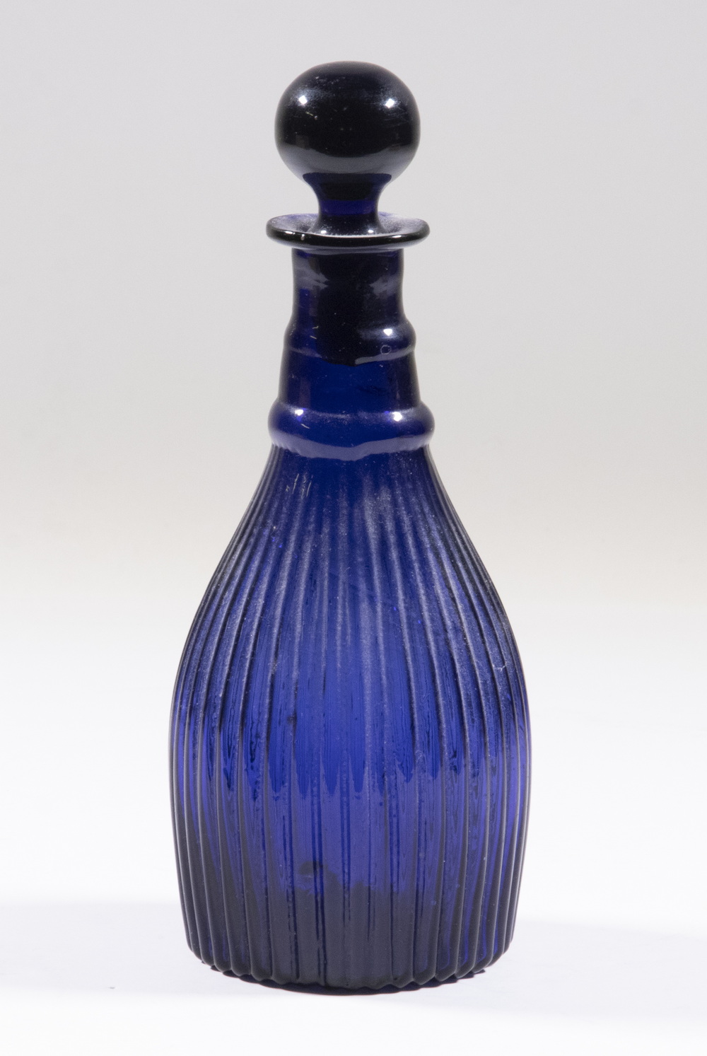 Appraisal: BOSTON SANDWICH COBALT BLUE GLASS BOTTLE th c Blown Glass