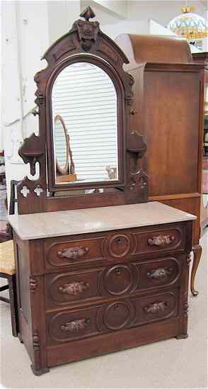 Appraisal: VICTORIAN WALNUT DRESSER American c the -drawer chest having a