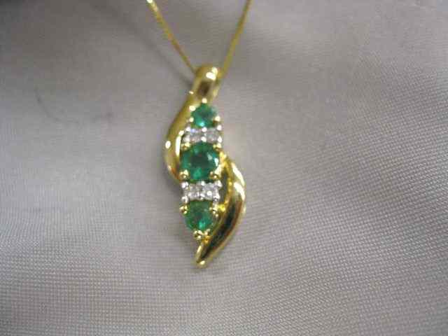 Appraisal: Emerald Diamond Pendant round emeralds with diamonds in between carat