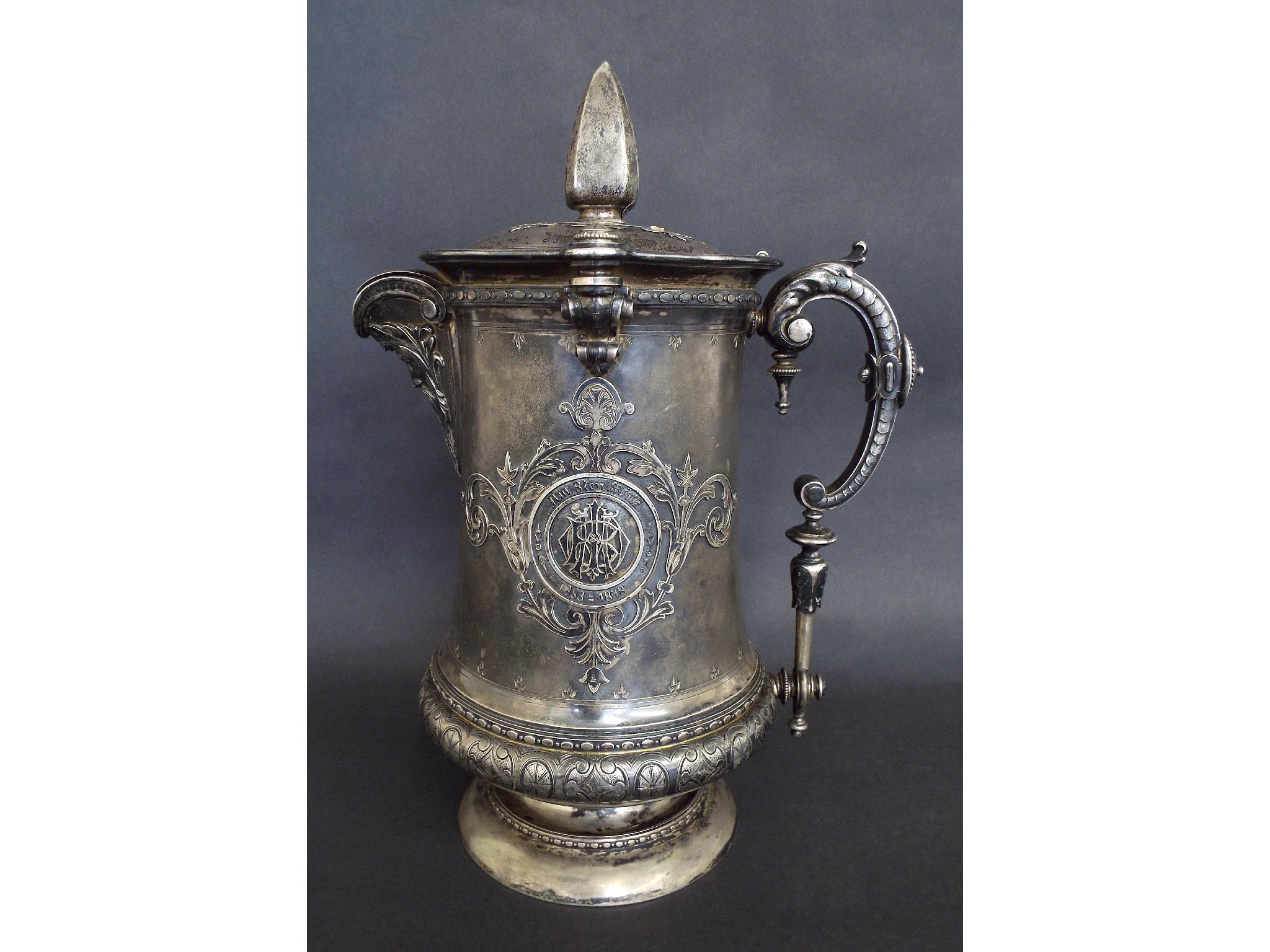 Appraisal: Massive German silver stein shaped jug embossed crest with monogram