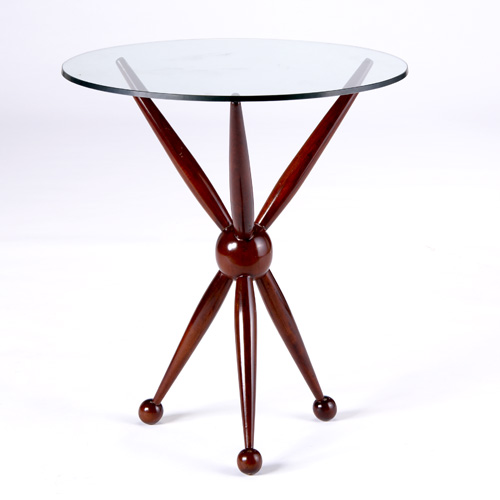 Appraisal: STYLE OF ALDO TURA Side table with round glass top