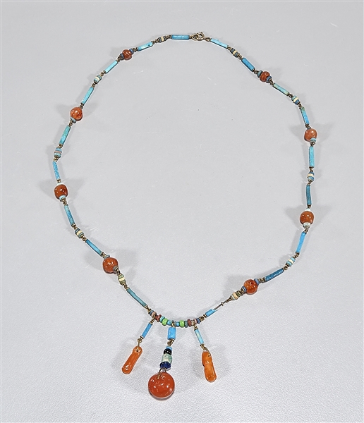 Appraisal: Necklace of Egyptian Late Period faience beads and polished carnelian