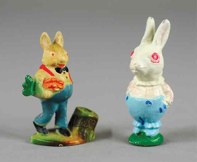 Appraisal: PETER RABBIT PAPERWEIGHTS Hubley cast iron standing example and one