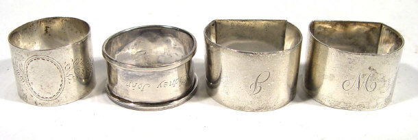 Appraisal: Pair of Edwardian silver napkin rings and two others the